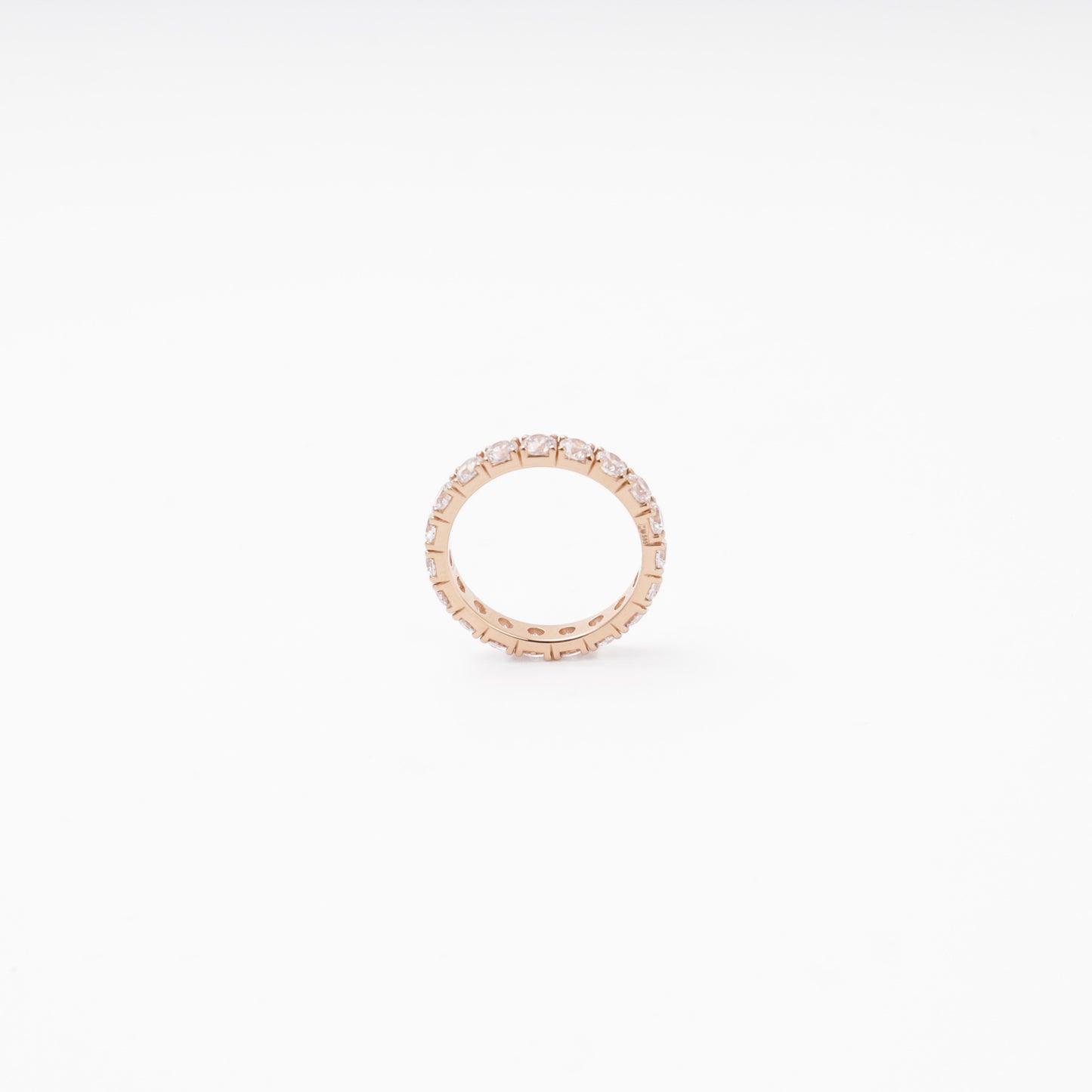 Rose gold ring with cubic zirconia all around — Kabluchka