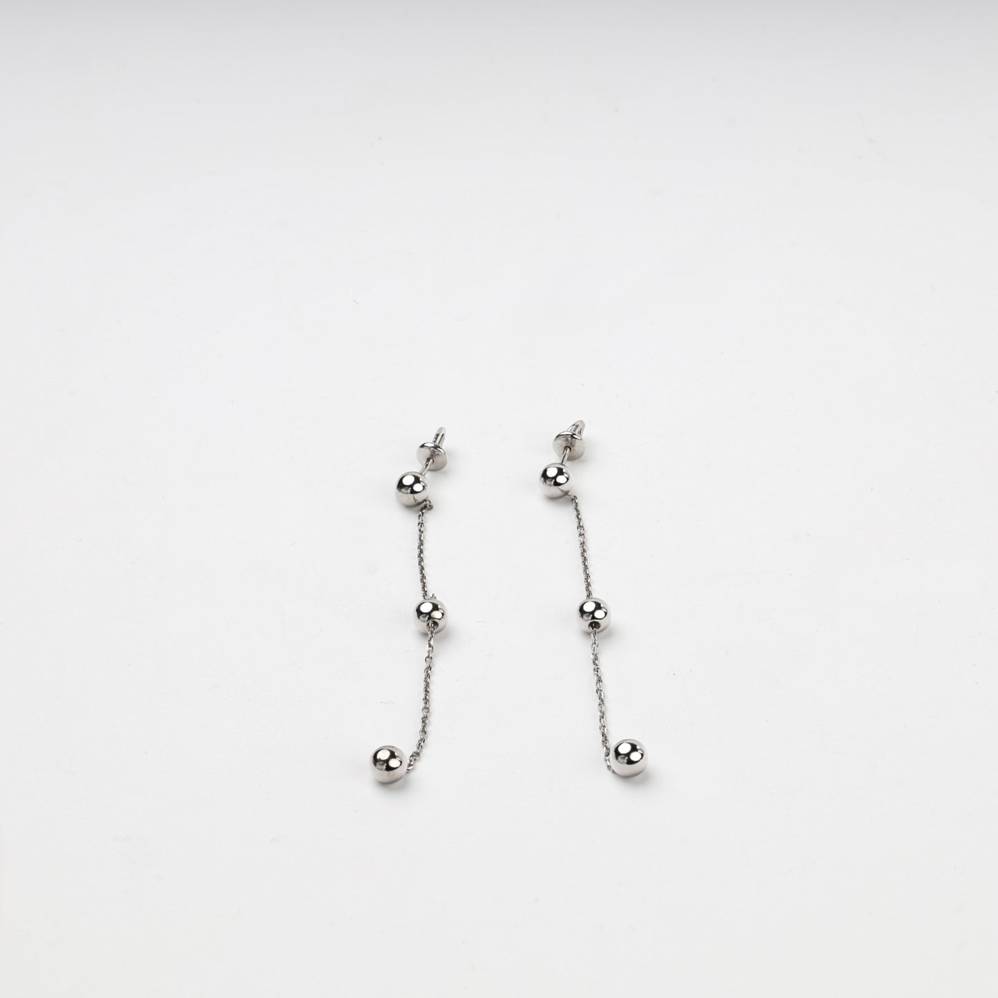Long silver threader drop earrings with three polished balls — Kabluchka