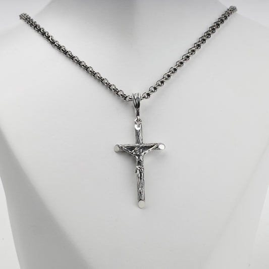 Textured silver crucifix pendant with sculpted Jesus figure