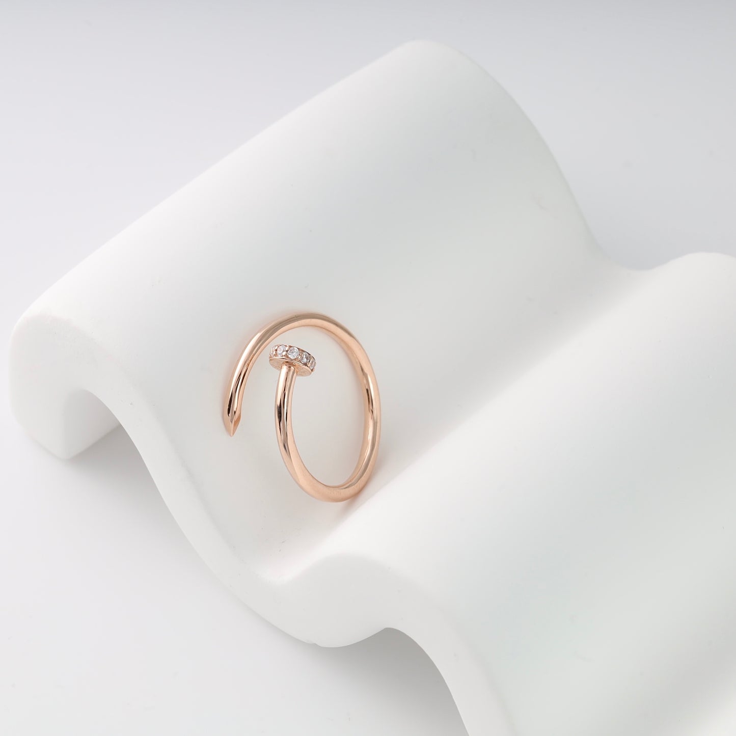 Rose gold 585 nail ring CZ stones close-up - Kabluchka Jewelry Store