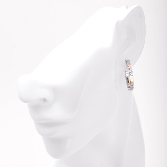 Silver 925 hoop earring with cubic zirconia shown on ear — Kabluchka