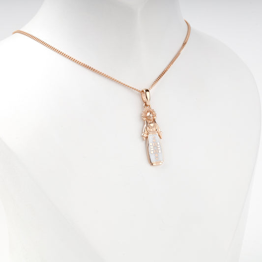 Rose Gold 14K white enamel motanka doll pendant, angled view