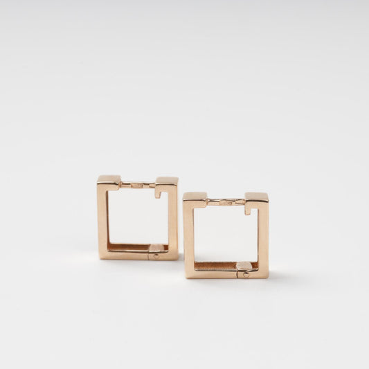 Symmetrical frontal view of minimalist 14K (585) Rose Gold square hoop earrings on a clean white background.