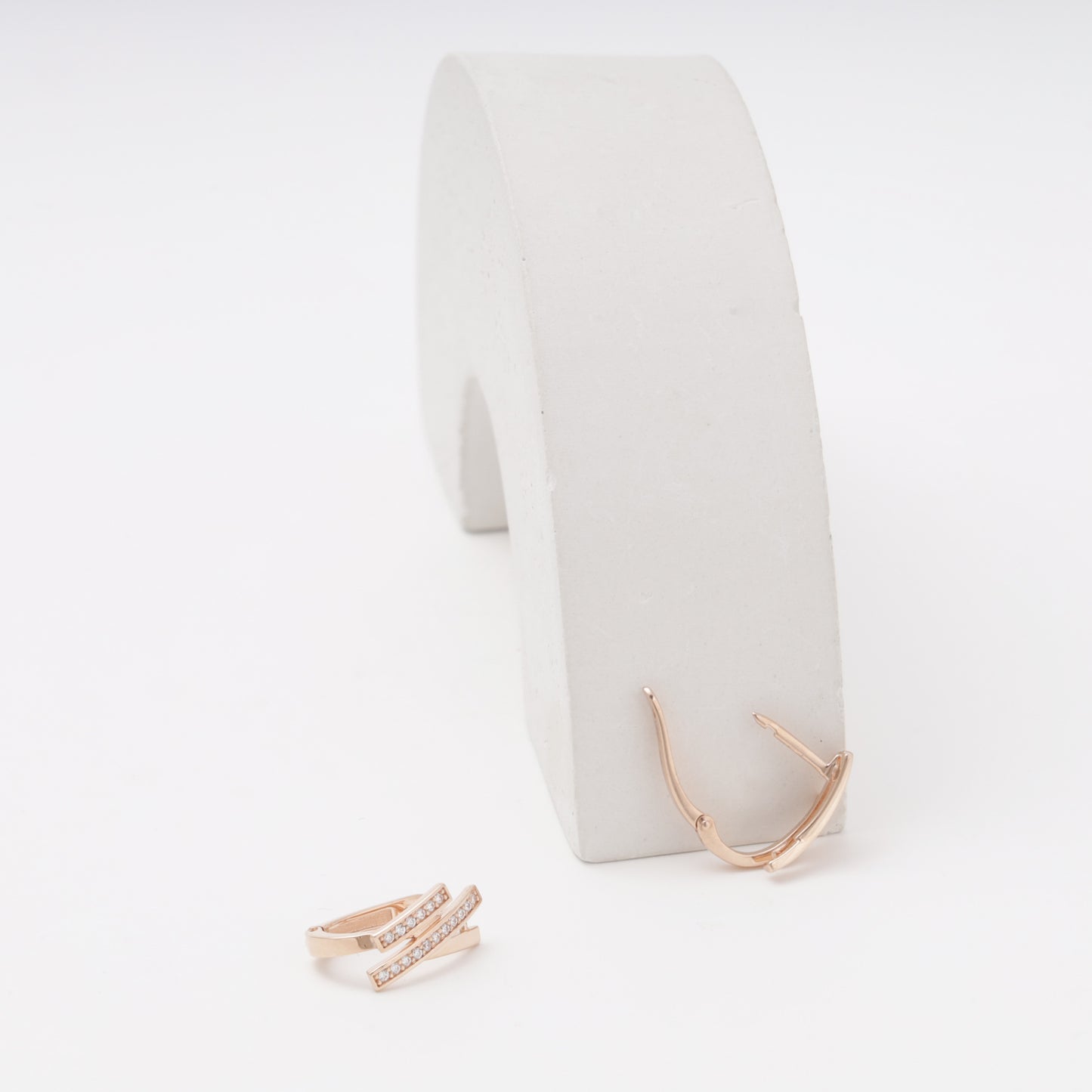 Rose gold geometric earrings with cubic zirconia, English lock open detail — Kabluchka