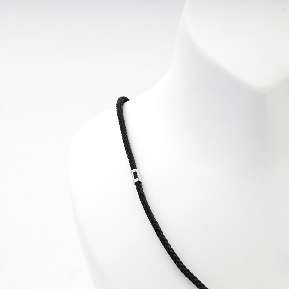 Black braided cord necklace with silver 925 spacer beads, product label