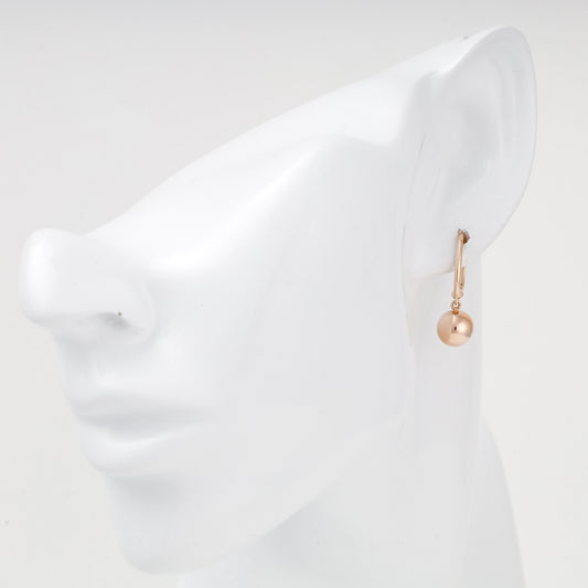Rose gold ball drop earring shown on ear — 2005973101 — Kabluchka