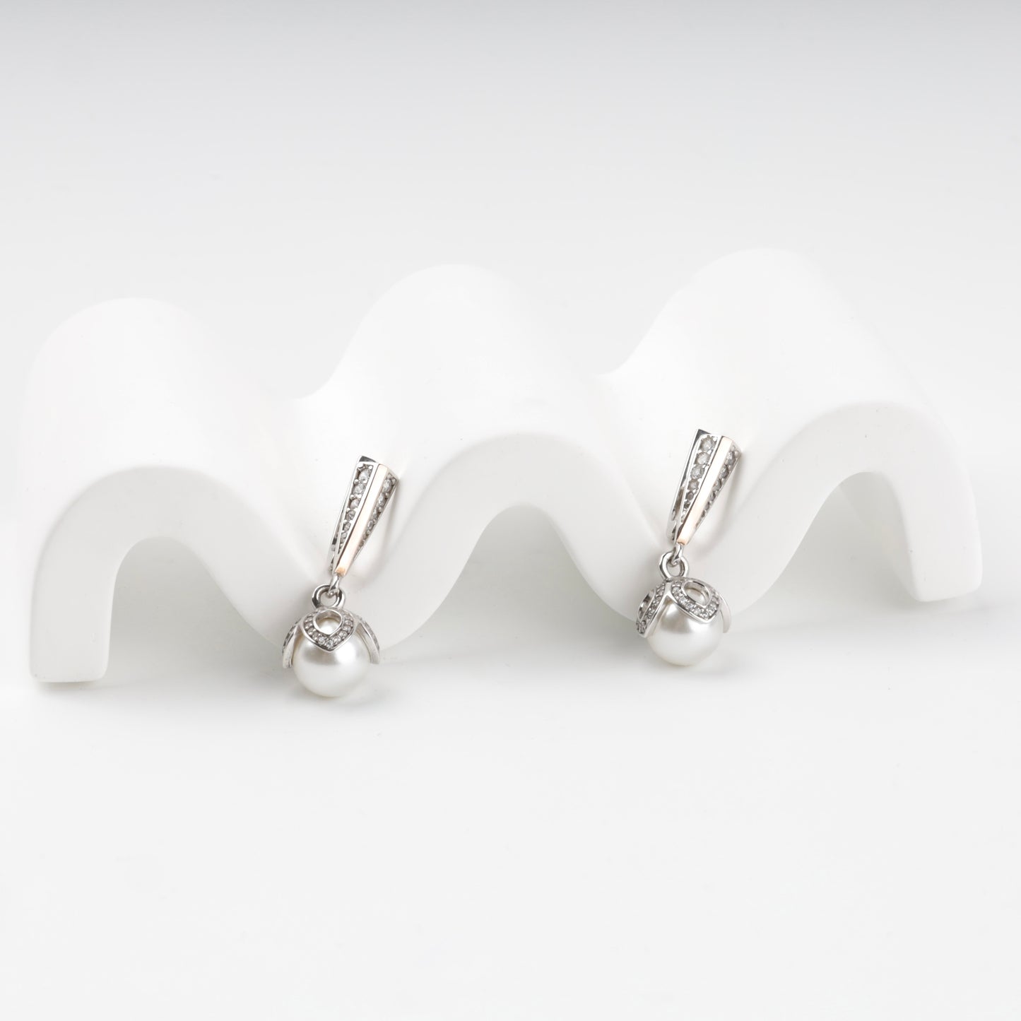Cubic zirconia drop earrings detail view — Kabluchka