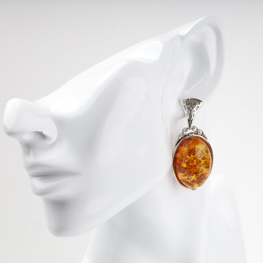 Amber drop earring shown on model — Kabluchka