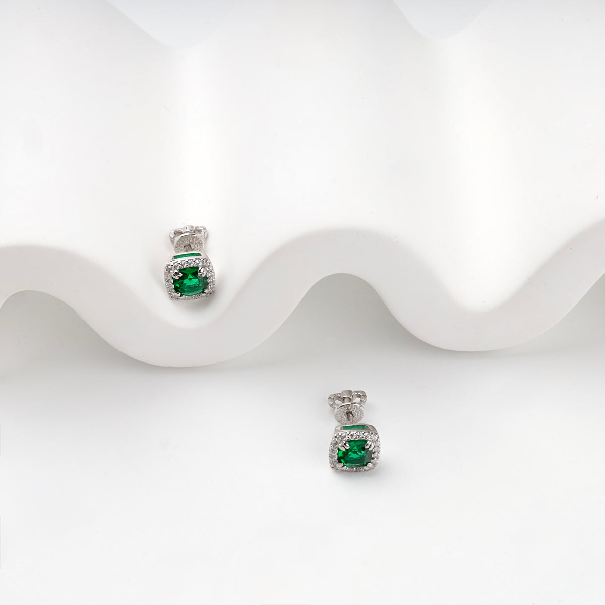 Silver 925 green cubic zirconia halo stud earrings, pair view
