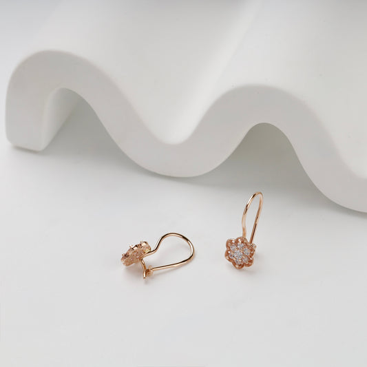 Rose Gold flower kids earrings showing hook fastenings and open backs