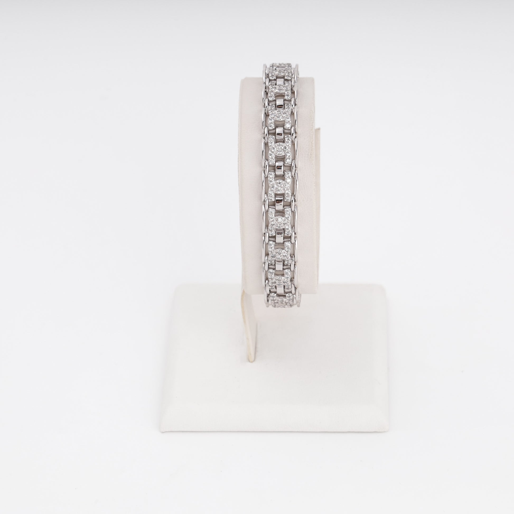 White gold abstract pavé bracelet close-up showing stone setting detail