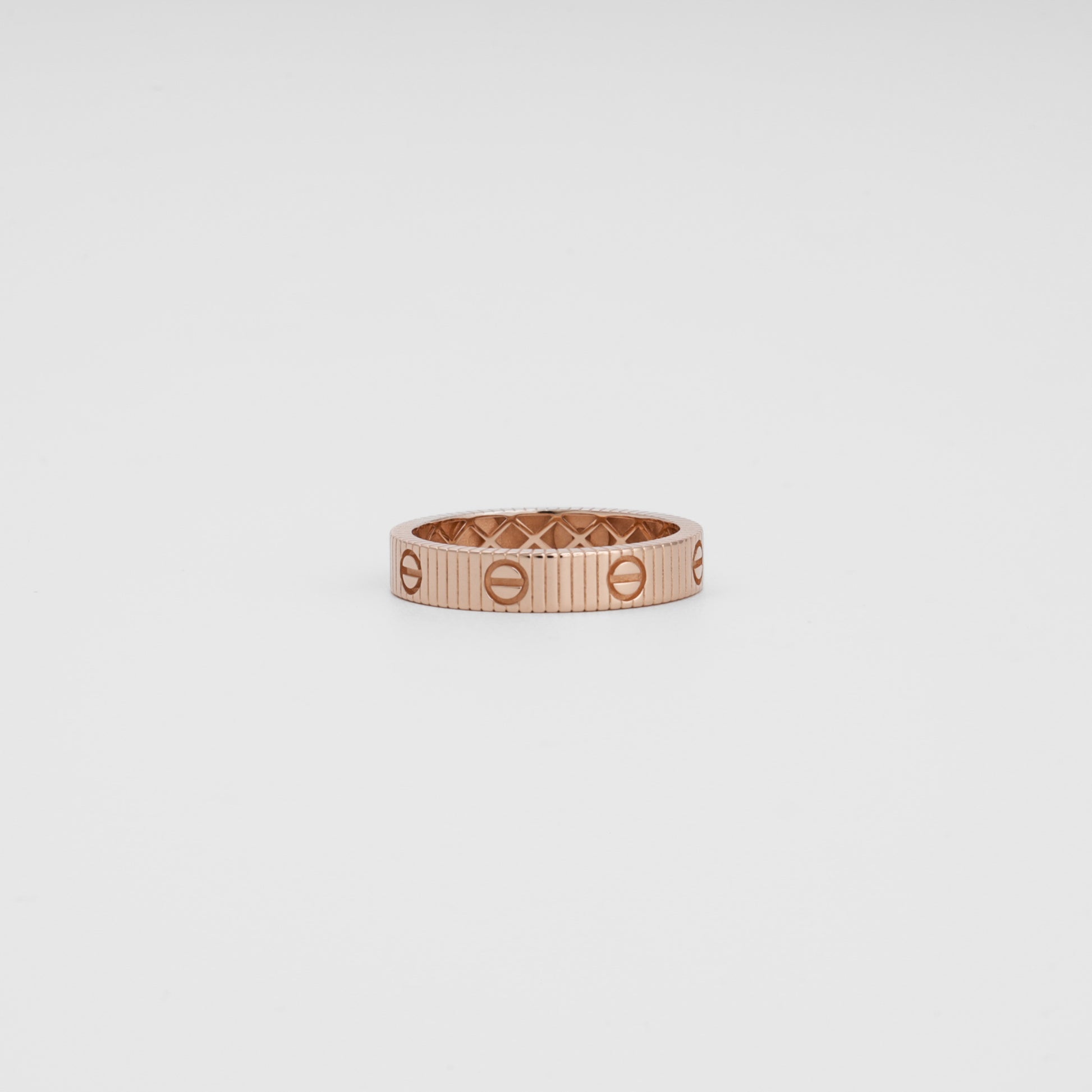 14k gold rose band ring with screw motif design on white background, Ukrainian Jewelry, minimalist gold ring, stacking wedding band.