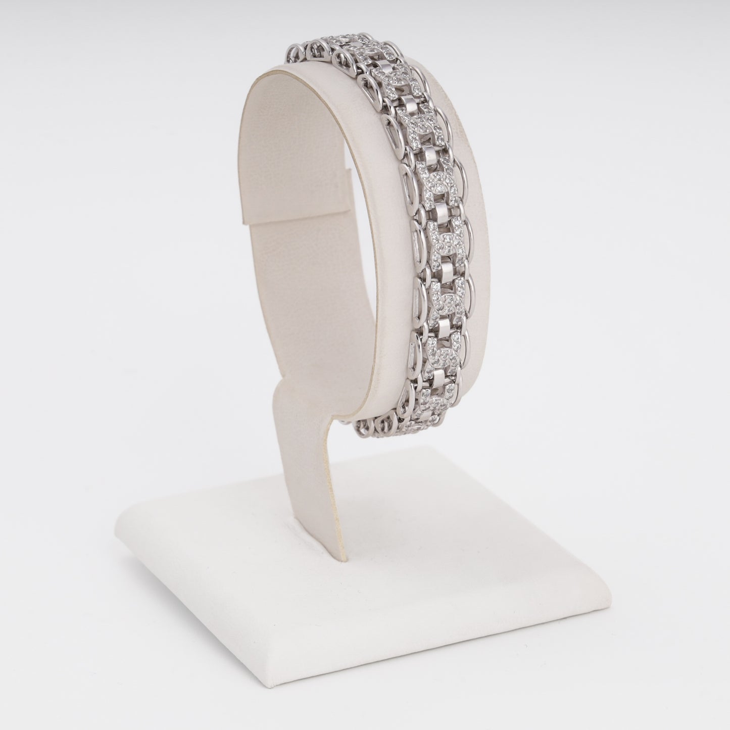 14K white gold link bracelet with pavé zirconia — side angle view