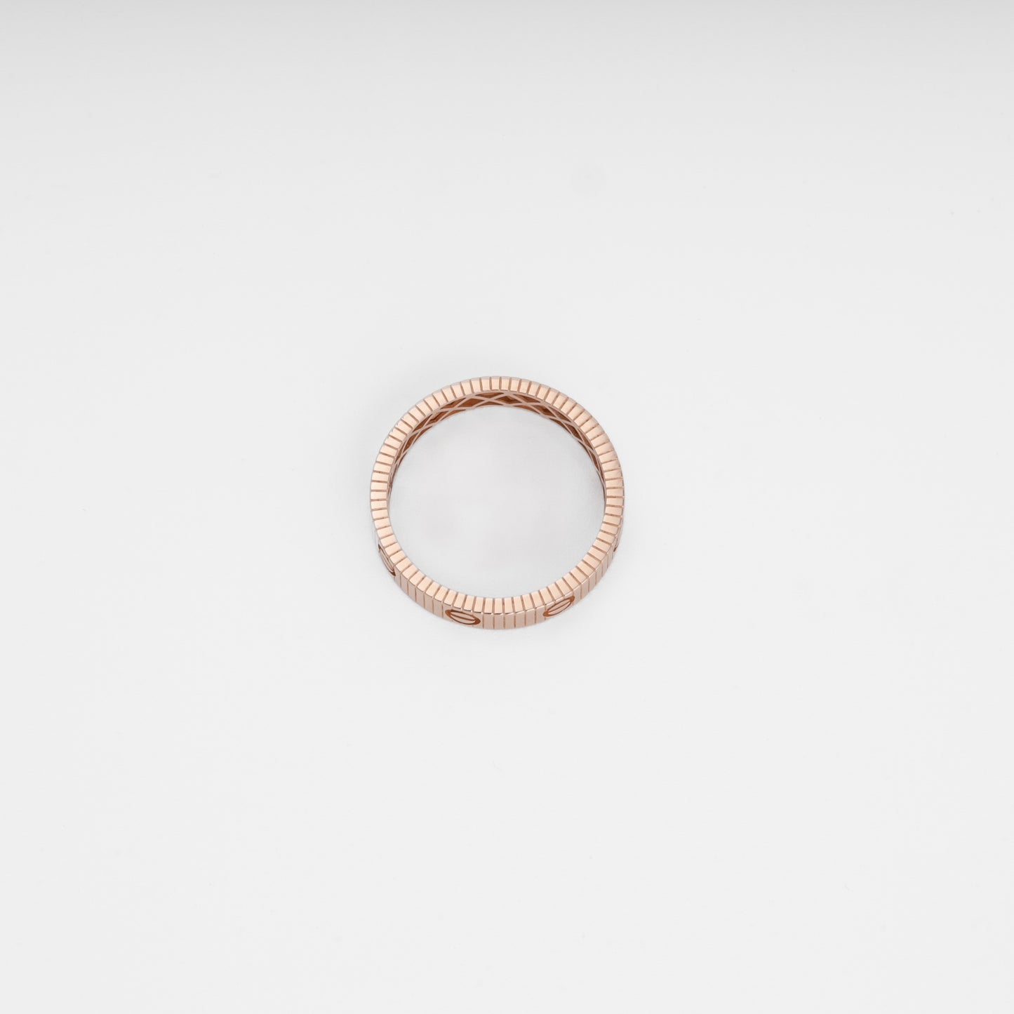 Rose gold ring with ridged band pattern, minimalist 14k gold stacking ring, Ukrainian Jewelry for everyday wear.