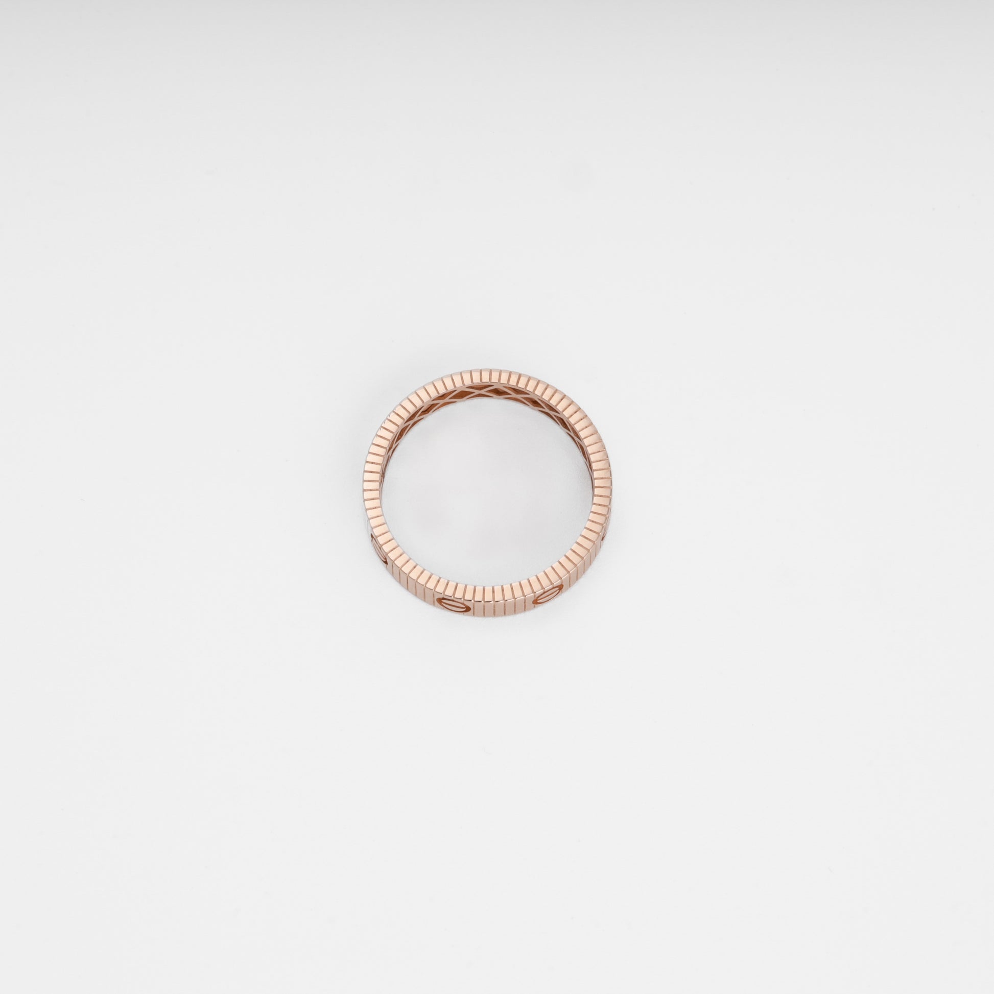 Rose gold ring with ridged band pattern, minimalist 14k gold stacking ring, Ukrainian Jewelry for everyday wear.