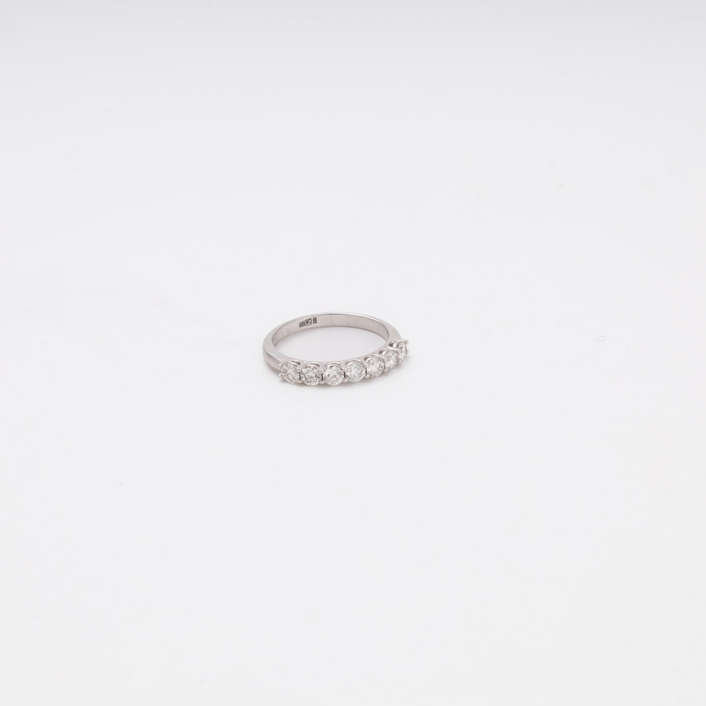 14K white gold seven-stone diamond ring angled view - Kabluchka jewelry