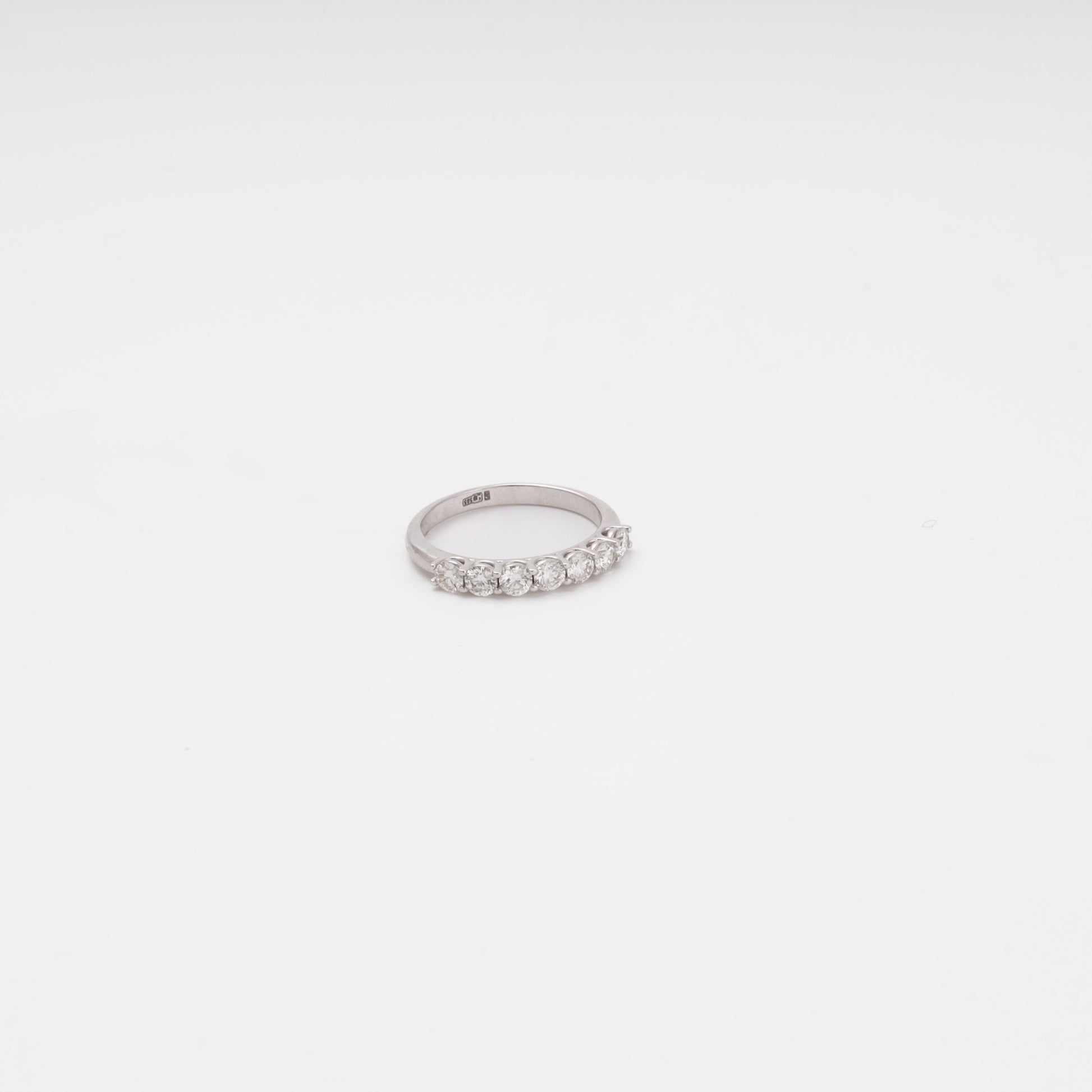 14K white gold seven-stone diamond ring angled view - Kabluchka jewelry