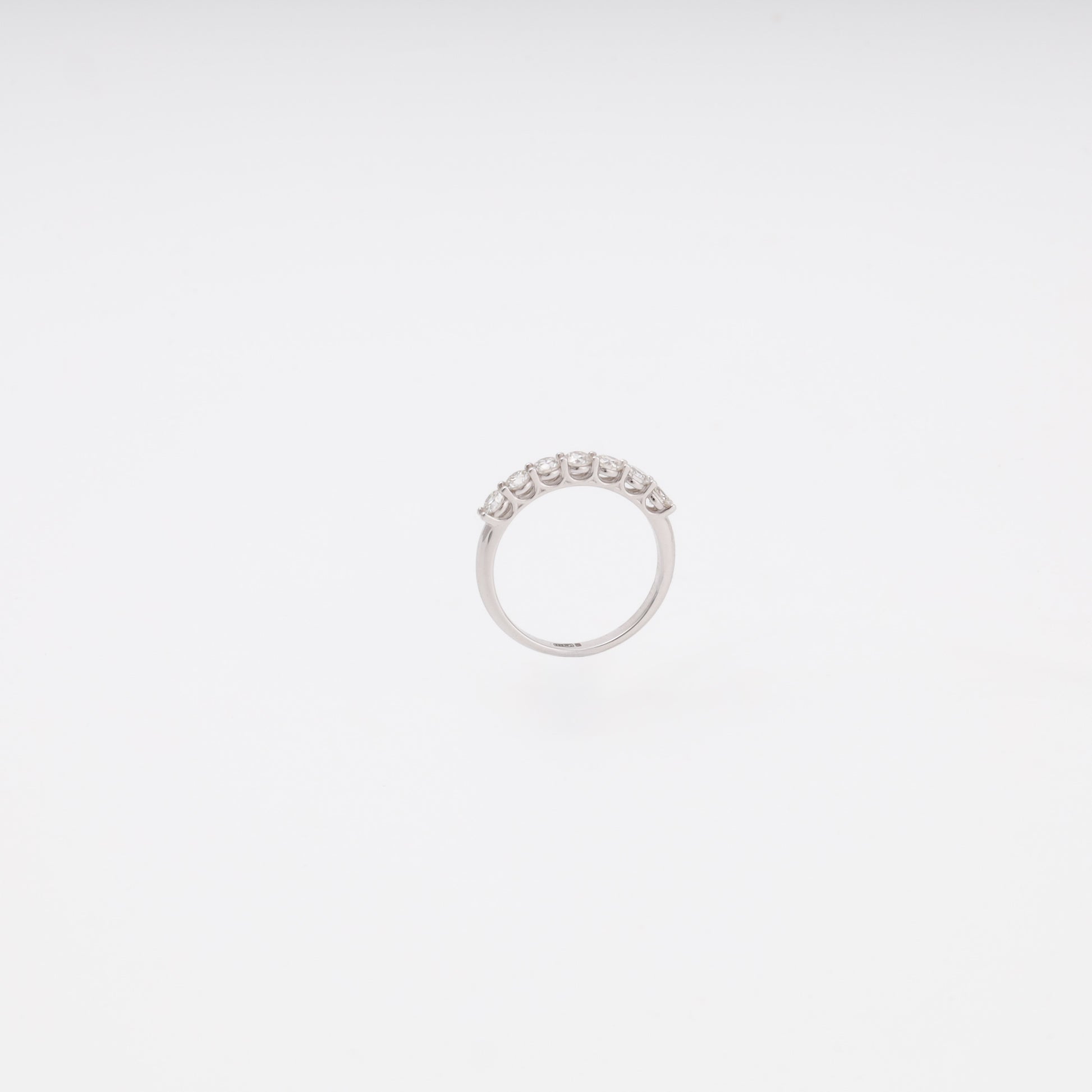 White gold diamond band ring showing brilliant-cut stones - Kabluchka