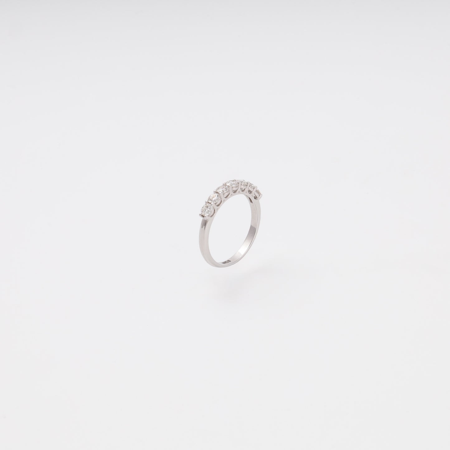 Diamond ring seven stones shared prong setting close-up - Kabluchka store