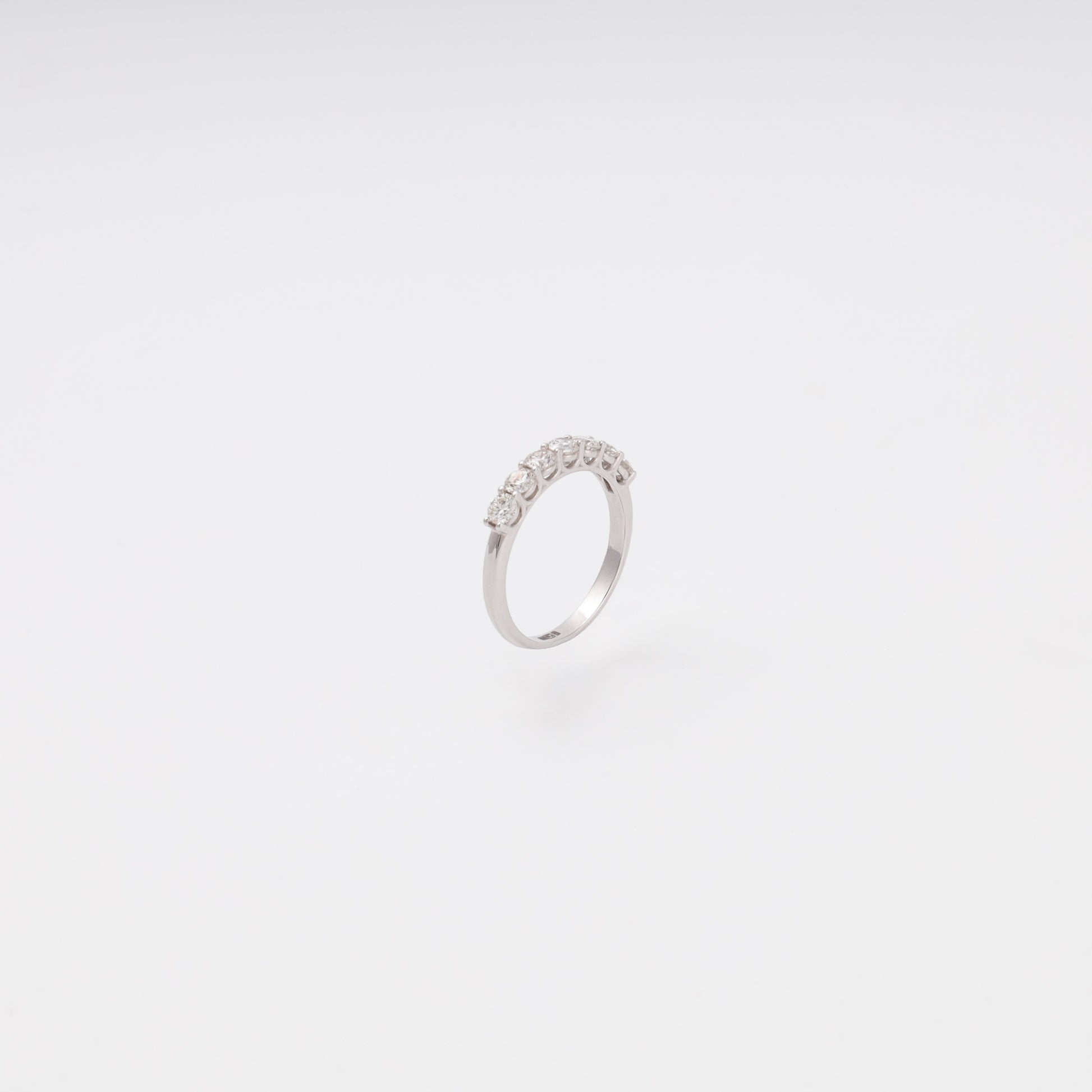 Diamond ring seven stones shared prong setting close-up - Kabluchka store