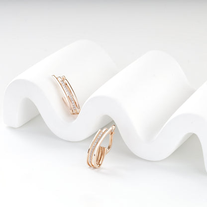 Rose gold 585 triple-band hoop earrings showing English locks