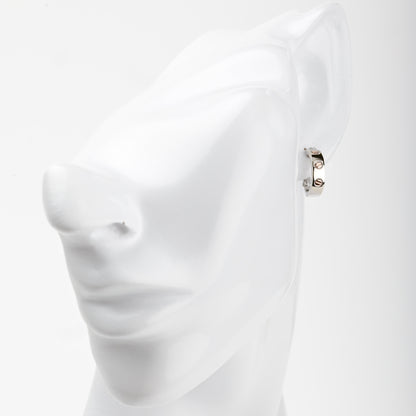White and rose gold 585 screw motif hoop earrings, angled view