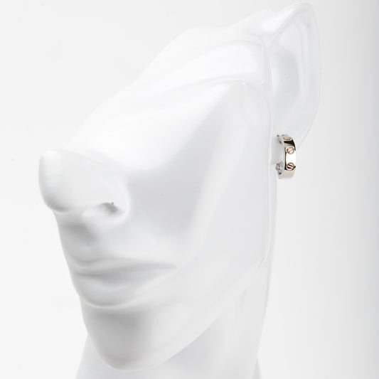 White and rose gold 585 screw motif hoop earrings, angled view
