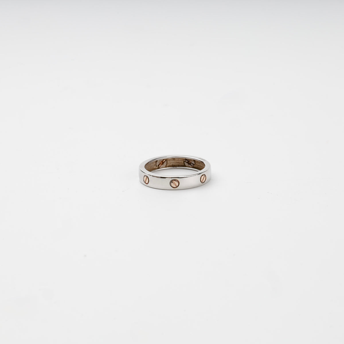 Two-tone gold 14K screw motif band ring, front view