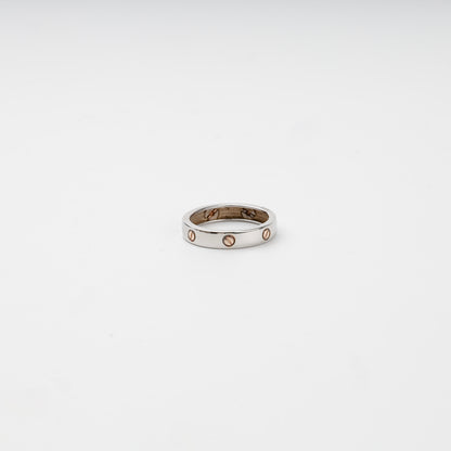 Two-tone gold 14K screw motif band ring, front view