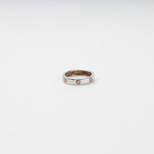 Two-tone gold 14K screw motif band ring, front view