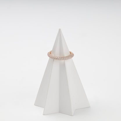 Double-row cubic zirconia ring on display stand