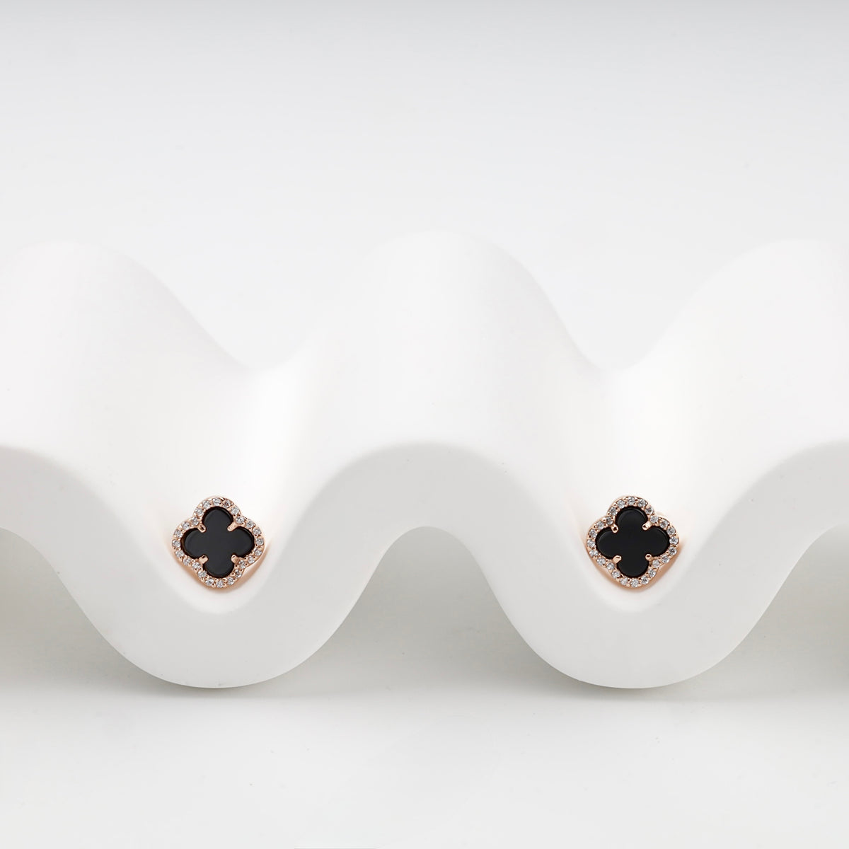 Rose Gold 14K black agate and cubic zirconia clover stud earrings — front view — Kabluchka