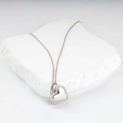 Clear cubic zirconia border on a Silver 925 heart locket