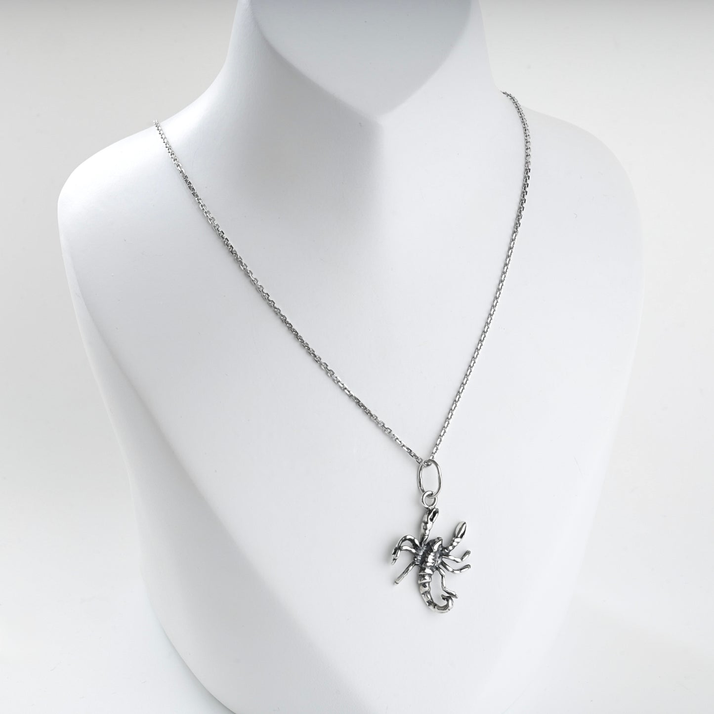 Silver scorpion pendant claws, legs and curved tail detail