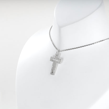 Rhodium-plated Silver 925 cubic zirconia open cross pendant, angled view — Kabluchka