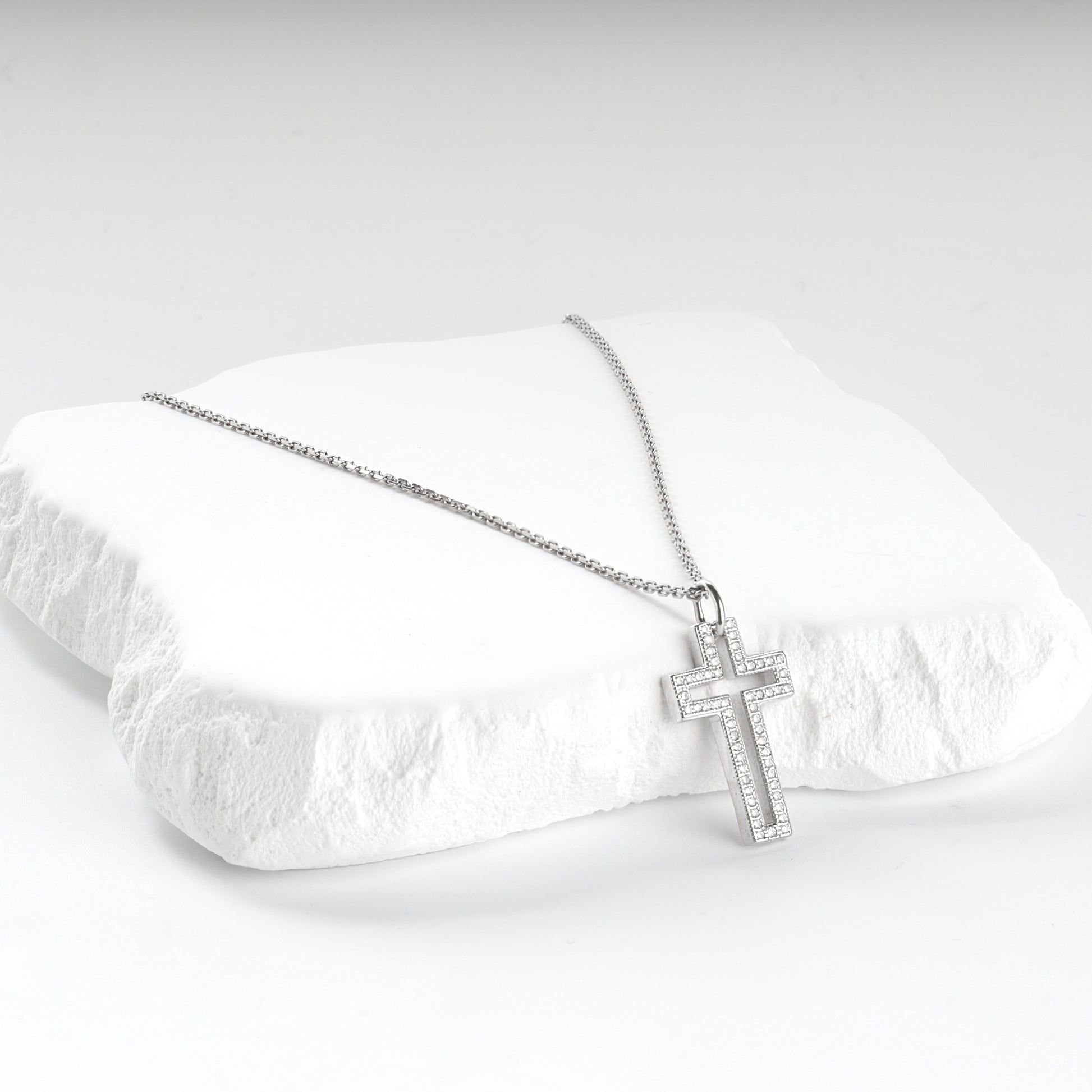 Rhodium-plated Silver 925 cubic zirconia open cross pendant, styled view — Kabluchka