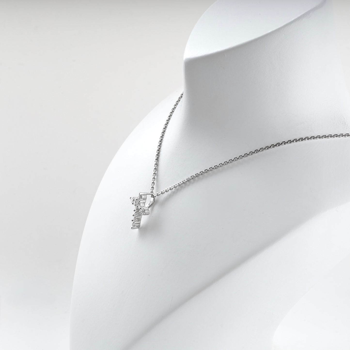 Rhodium-plated Silver 925 cluster zirconia cross pendant, product view 4 — Kabluchka