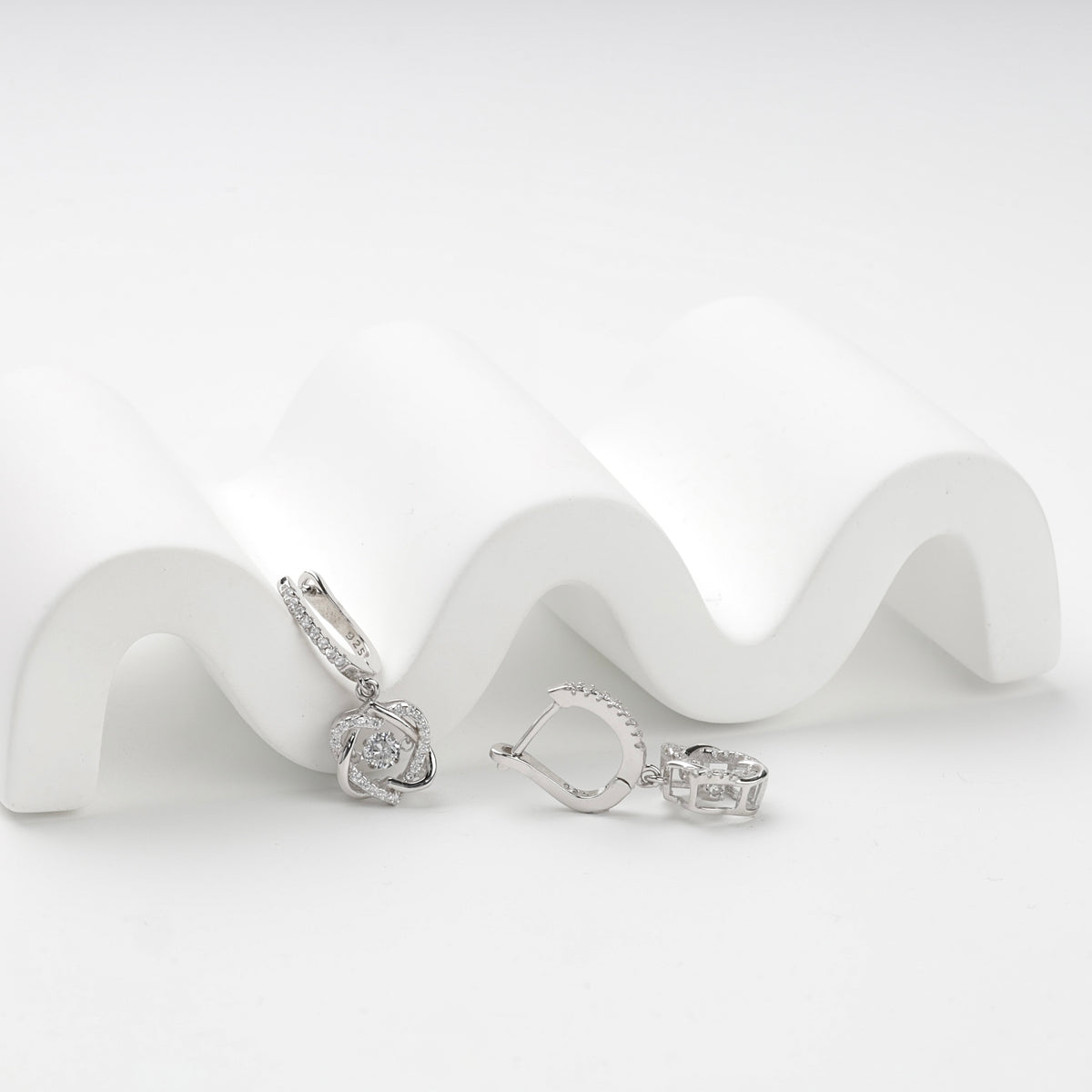 Silver floral drop earrings with English-lock clasps — open view — Kabluchka