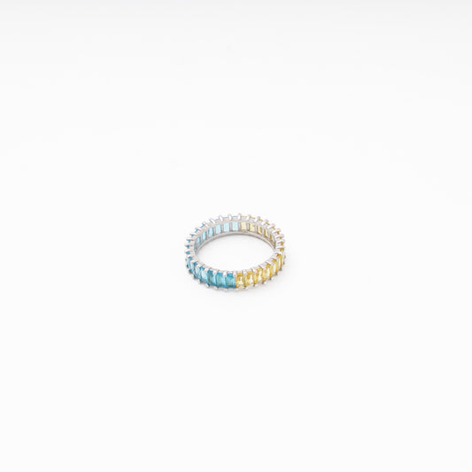 Silver eternity ring with blue CZ, front view, Kabluchka