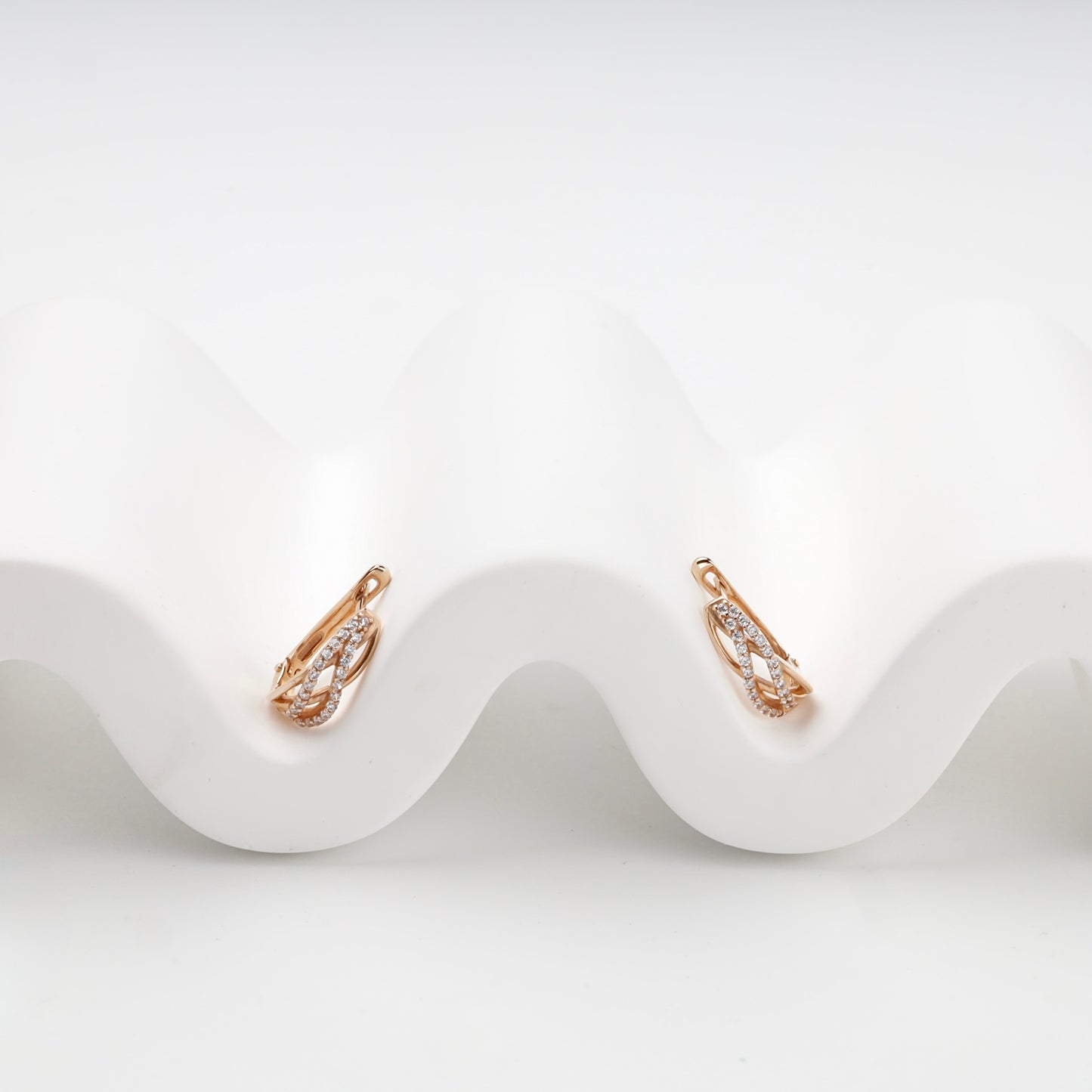 Rose Gold 14K interlaced cubic zirconia earrings, product view 1 — Kabluchka