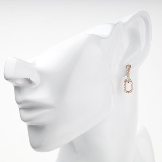 Rose Gold cubic zirconia elongated huggie earring — on-ear view — Kabluchka