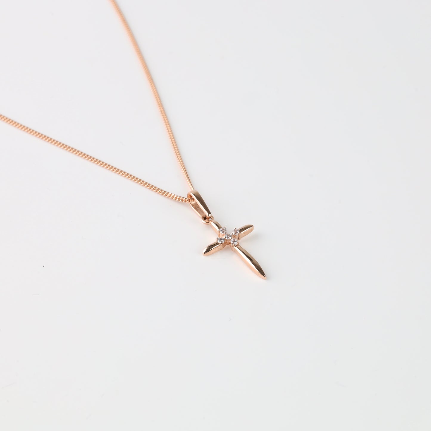Rose gold cross pendant with chain detail — Kabluchka
