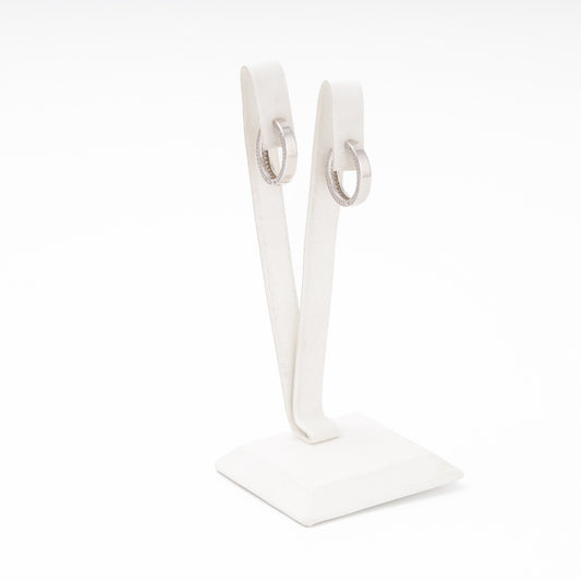 Silver huggie earrings CZ close-up, Kabluchka