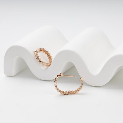 Geometric pyramid hoop earrings, open closure view