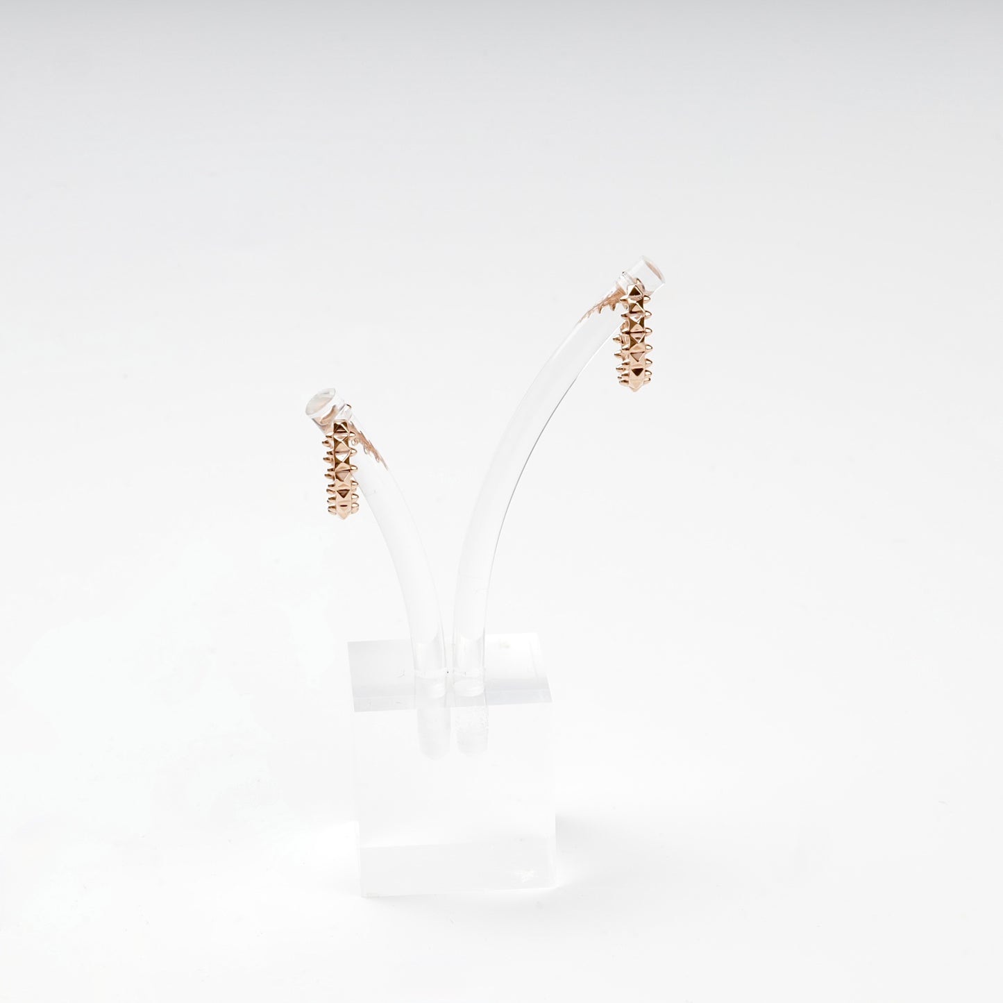 Pyramid stud rose gold hoops, side profile
