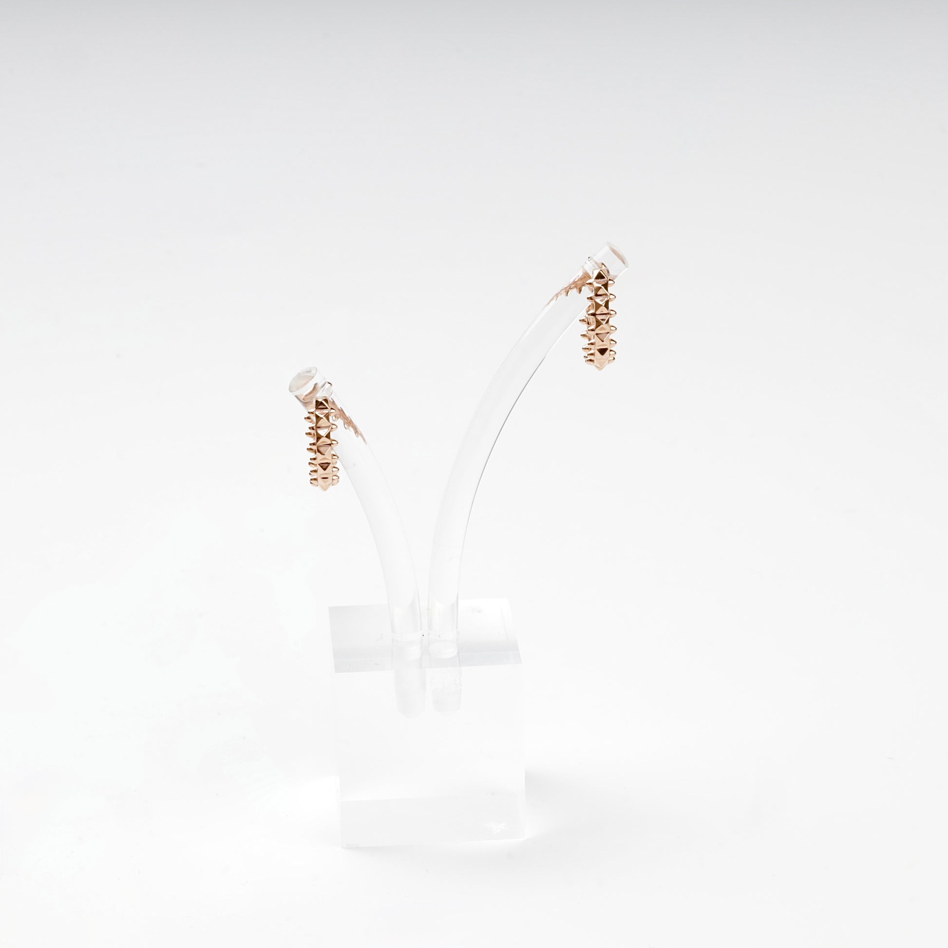 Pyramid stud rose gold hoops, side profile