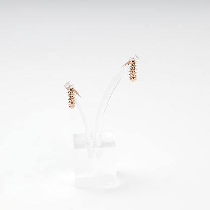 Pyramid stud rose gold hoops, side profile