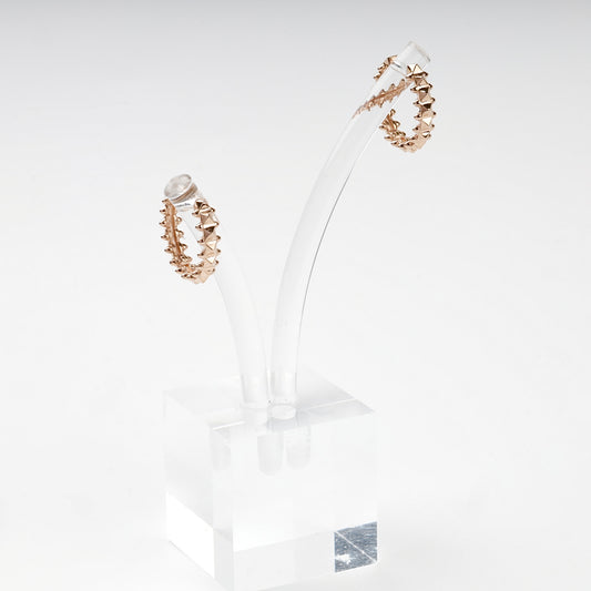 Rose Gold geometric hoop earrings on display stand