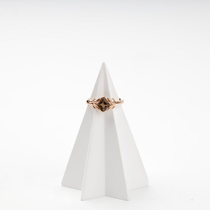 Faceted smoky quartz diagonal-set ring on display — Kabluchka