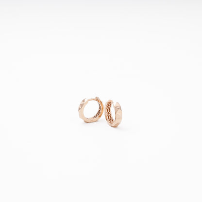 14K rose gold huggie earring faceted surface close-up — Kabluchka
